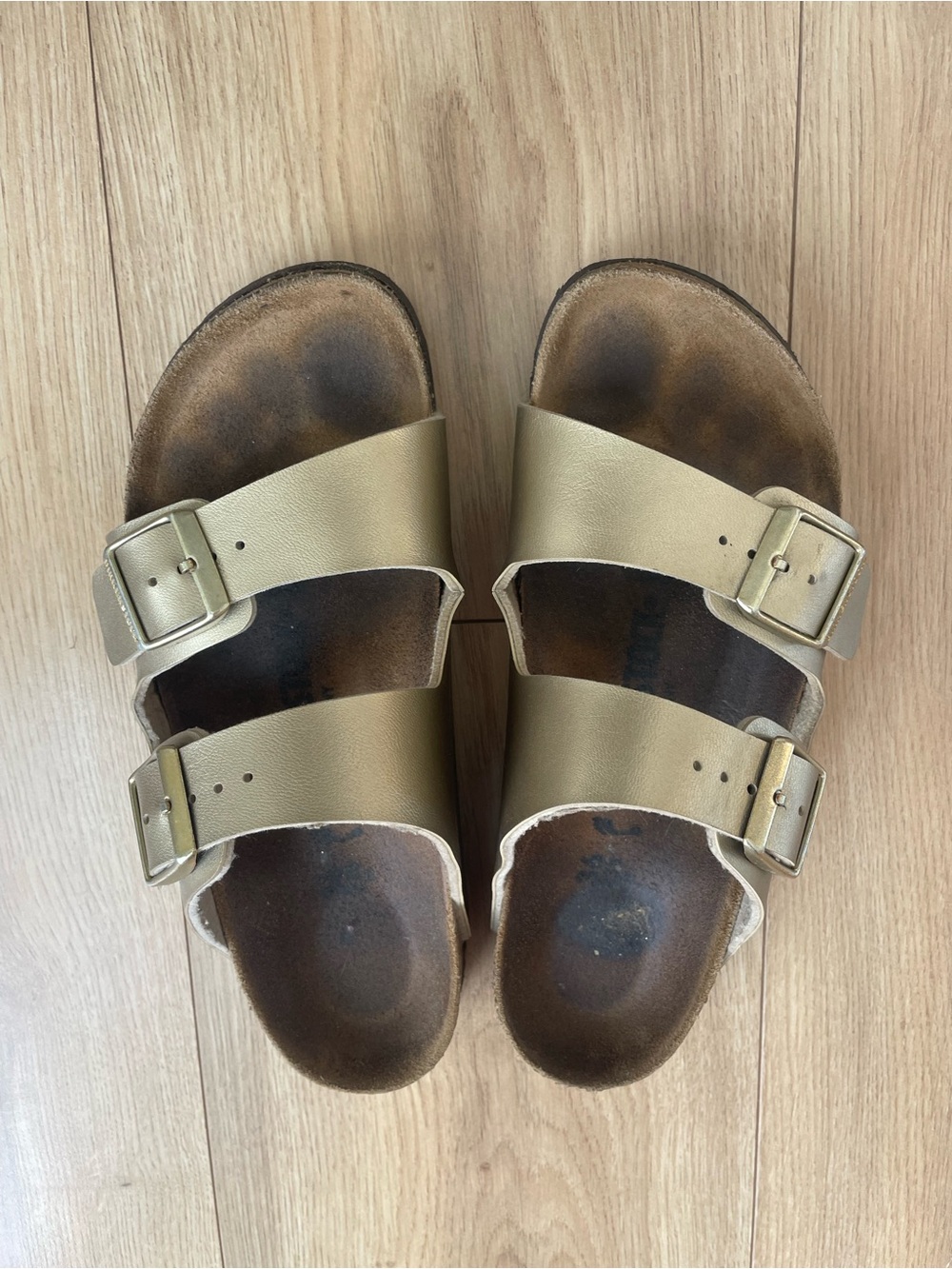 Birkenstock Sandals in Metallic Gold